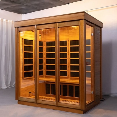 Sitio infrarrojo lejano de madera sólido interior de la sauna del carbono de 4 personas con la puerta de cristal